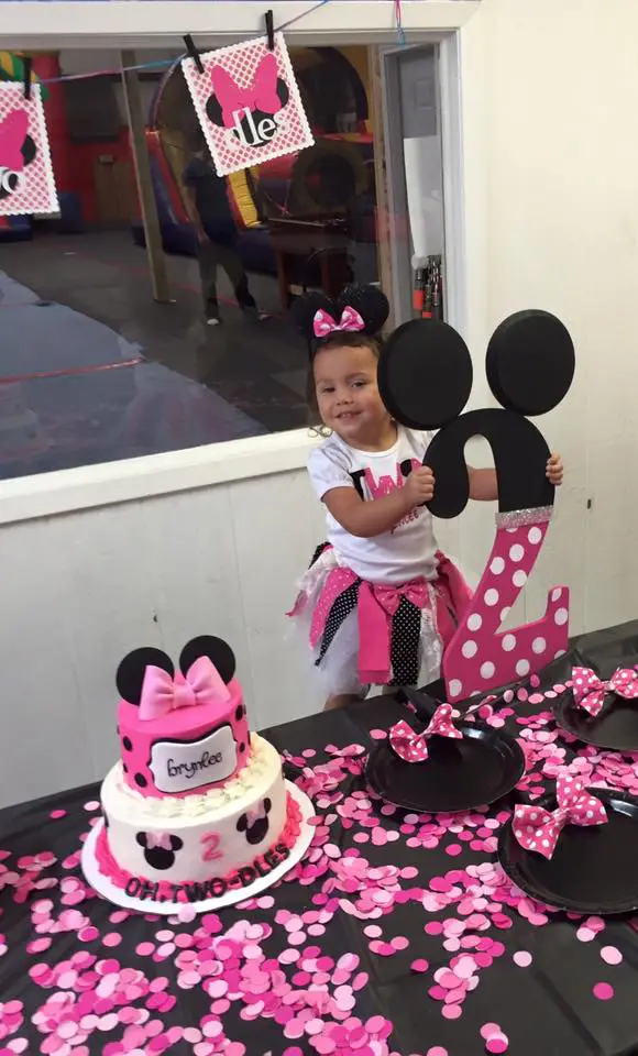Birthday girl with cake at the private kids party venue in Waco TX